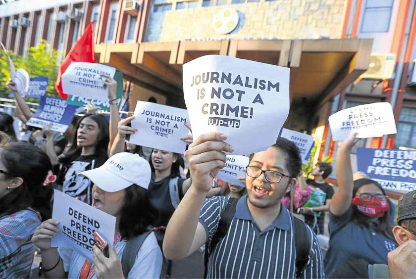Students hold a rally at the University of the Philippines Diliman on Thursday to condemn the arrest of Rappler CEO Maria Ressa. —RICHARD REYES