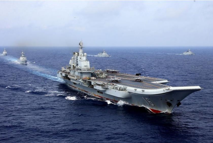 Chinaâ€™s Liaoning aircraft carrier takes part in a Peopleâ€™s Liberation Army Navy military drill in the western Pacific Ocean on April 18, 2018.