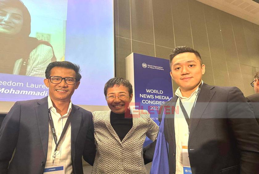 Executive Director of Eleven Media Group, Ko Min Thaw Thut, Chief Editor of The Daily Eleven Newspaper, Ko Kyaw Zaw Linn and winner of the 2021 Nobel Peace Laureate and 2018 Golden Pen Award Maria A. Ressa, are seen at the Golden Pen Award ceremony.