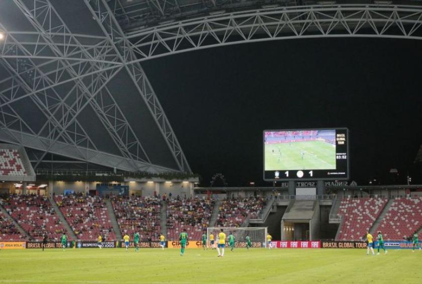 Brazil playing Senegal in a friendly at the 55,000-capacity National Stadium in Kallang on Oct 10, 2019. World Cup stadiums are required to seat at least 60,000 fans for the semi-finals and 80,000 for the opening match and final.ST PHOTO: JASON QUAH