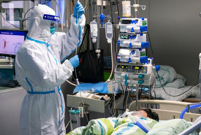 A patient with infected with the new strain of coronavirus is under treatment at a hospital in China. Yonhap