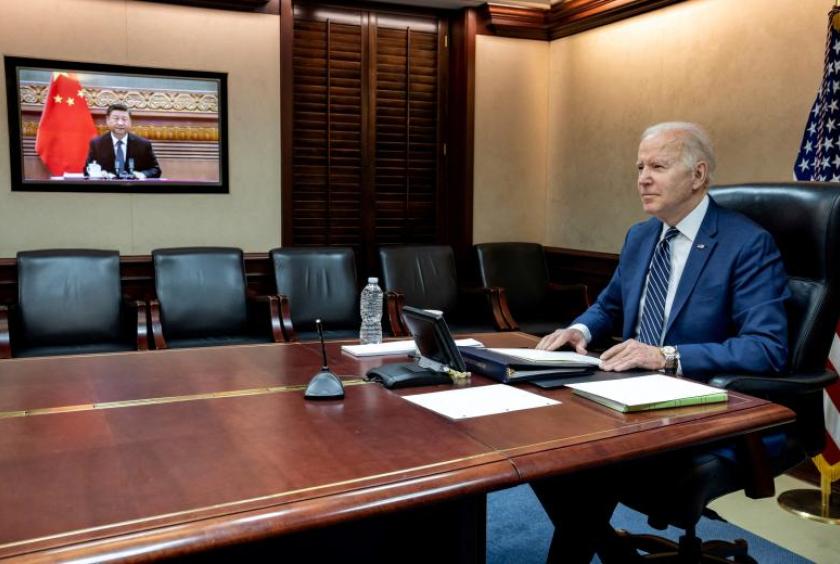 US President Joe Biden (right) holds virtual talks with Chinese President Xi Jinping at the White House, on March 18, 2022. PHOTO: REUTERS