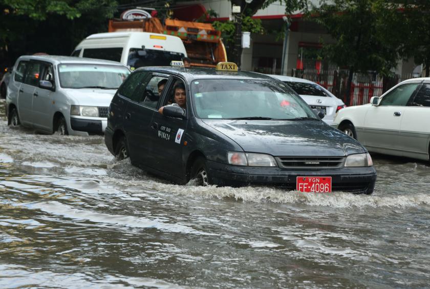 Flood occurred in Sanchaung Township due to torrential rain on September 15th noon (Photo-Myo Htet Paing)