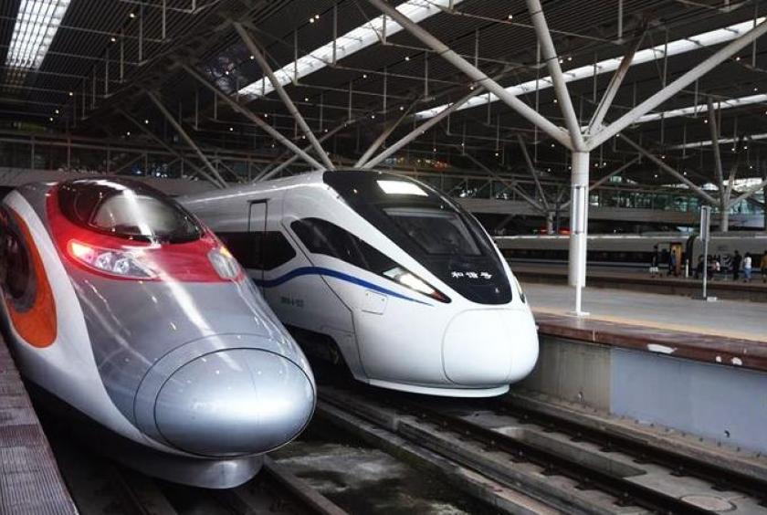 This Sept 23, 2018 photo shows two high-speed trains at Shenzhen North Railway Station in Guangdong province. (WANG SHEN / XINHUA)