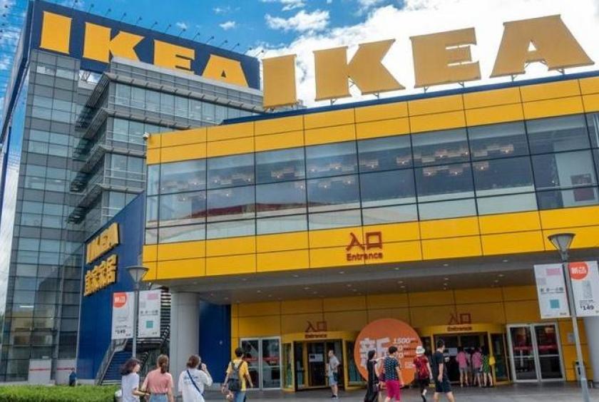 In this undated photo, pedestrians walk past an IKEA center in Shanghai. (PHOTO PROVIDED TO CHINA DAILY)