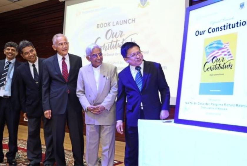 Malanjum (right) with Prof Shad (second right) at the book launching ceremony at UM. With them are (from left) Girish, Prof Johan and UM vice-chancellor Datuk Dr Abdul Rahim Hashim.