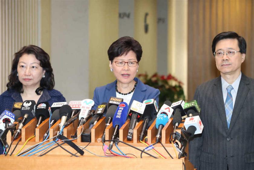 Hong Kong Chief Executive Carrie Lam Cheng Yuet-ngor (center), Secretary for Security John Lee Ka-chiu (right) and Secretary for Justice Teresa Cheng Yeuk-wah meet with the media at the lobby of the Office of the Chief Executive on Monday. [Photo provide to China Daily] 