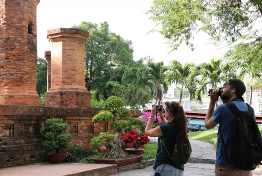 Foreign tourists are seen at Ponagar Tower in Nha Trang city, the coastal province of Khánh Hòa. In the upcoming periods, there are many policies for foreign tourists to help develop tourism after the COVID-19 outbreak. — VNA/VNS Photo Tiên Minh