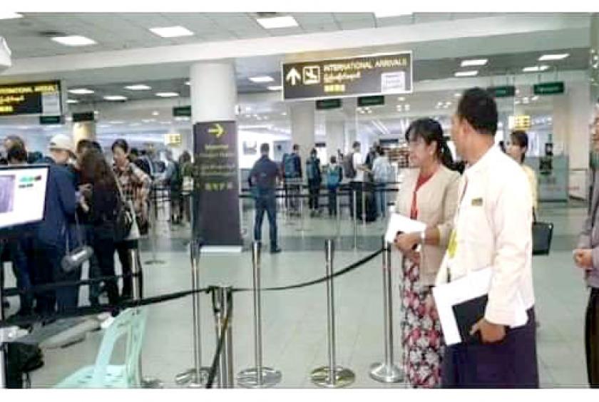 Public Health Department is monitoring passengers with thermoscan. (Photo-Public Health Department)
