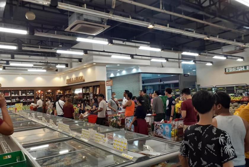 A shopping center in Yangon is flooded with buyers after the Ministry of Health and Sports announced the detection of virus.