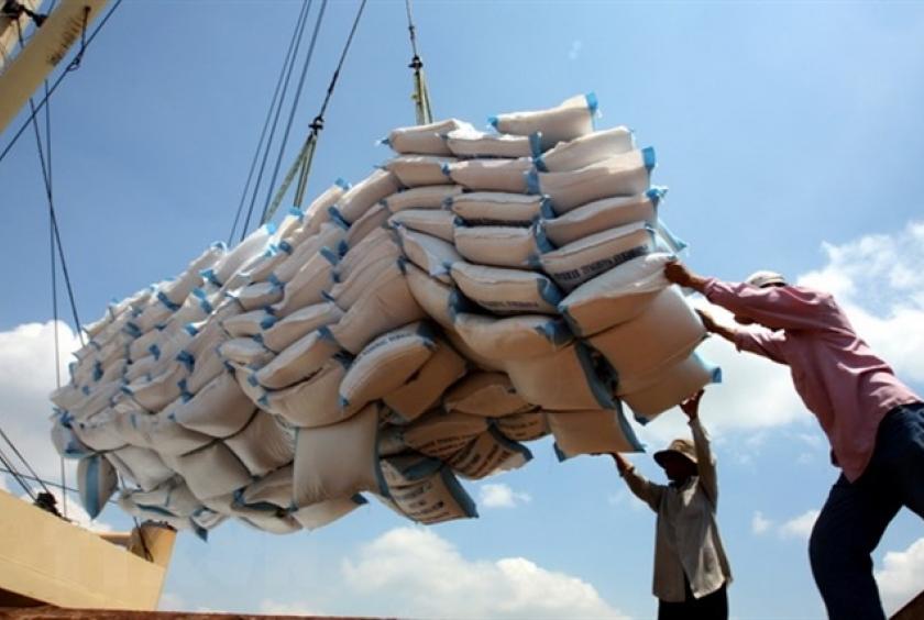 Vietnamese rice being loaded for export. High demand for food set the stage for Việt Nam to take the lead in global rice this year. — VNA Photo