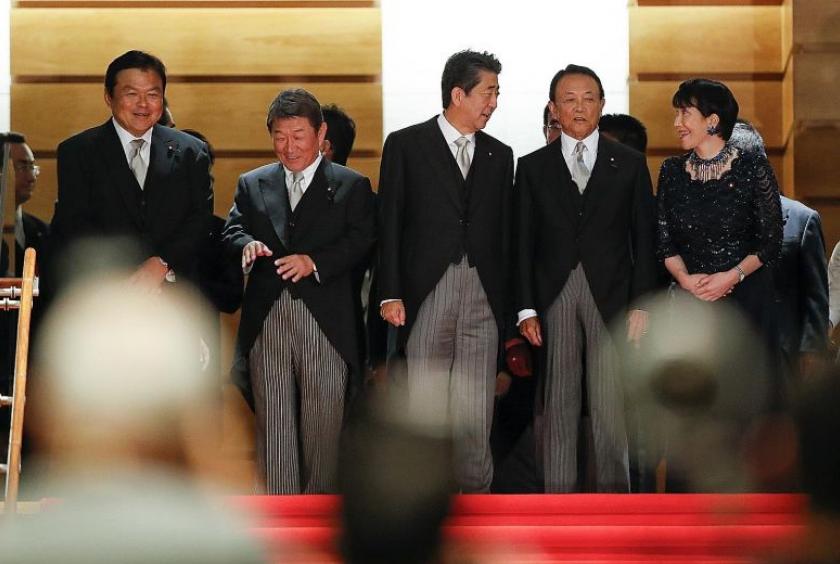 Members of Japan's new Cabinet include (from left) Land, Infrastructure, Transport and Tourism Minister Kazuyoshi Akaba, Foreign Minister Toshimitsu Motegi, Prime Minister Shinzo Abe, Finance Minister Taro Aso and Internal Affairs Minister Sanae Takaichi. This is Mr Abe's fifth Cabinet reshuffle since he took office in December 2012. He has reassigned all but two of the 19 portfolios.PHOTO: EPA-EFE