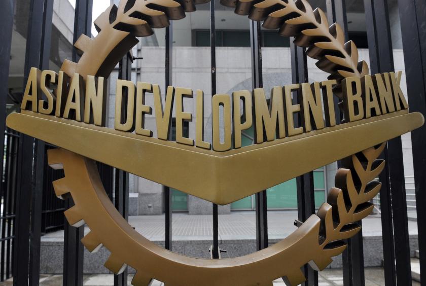 The growth outlook remains highly vulnerable to either a prolonged outbreak or a resurgence of cases. (Photo: AFP) 