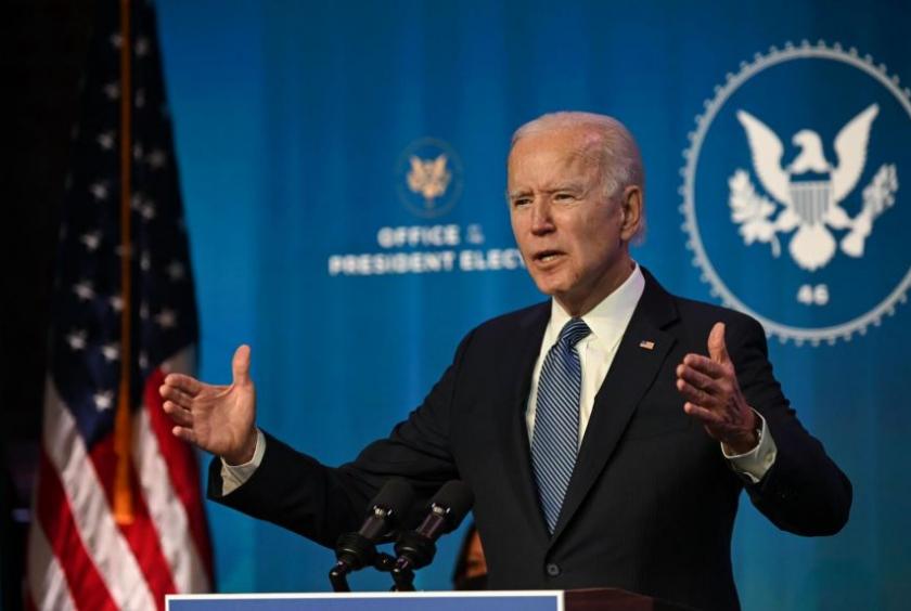 Mr Joe Biden will be inheriting twin crises when he takes over as President: controlling Covid-19 and providing more relief for Americans struggling in the battered economy.PHOTO: AFP