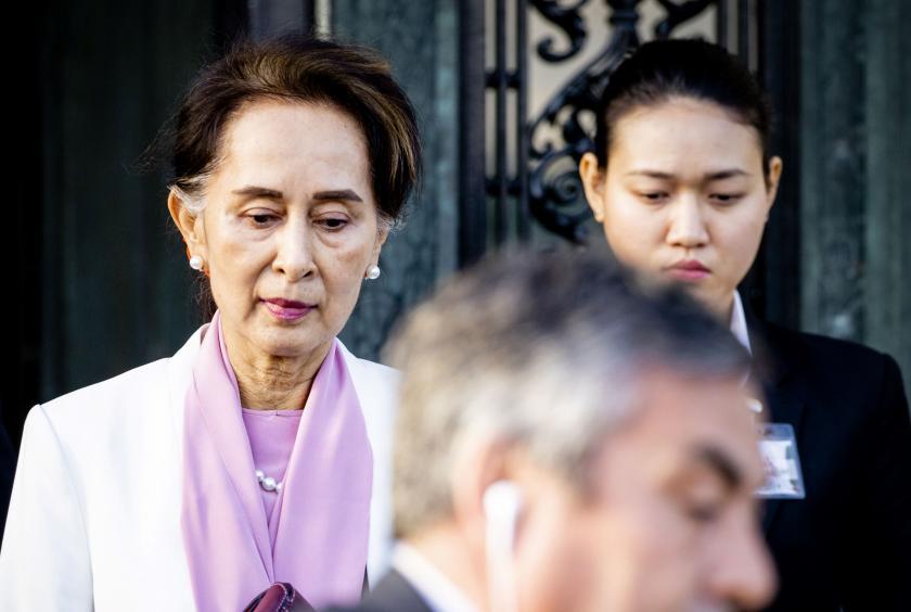 State Counselor and Foreign Minister leaves the ICJ after the first half of the hearing. (Photo - AFP) 
