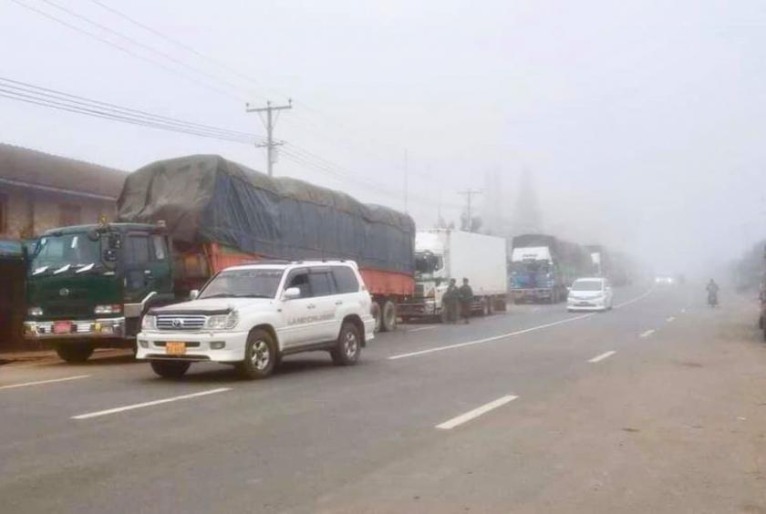Cargo trucks and passenger buses are in a queue as a clash broke out between Tatmadaw and TNLA.