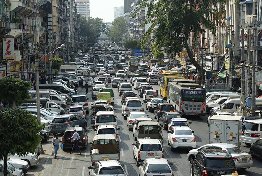 Traffic flow seen on a busy road in Yangon city on February 15. 