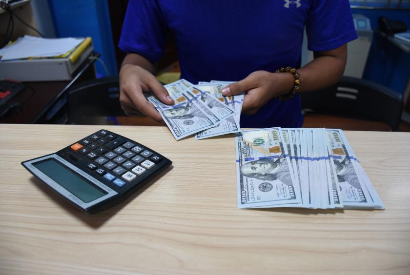 Photo shows a local foreign exchange counter. 