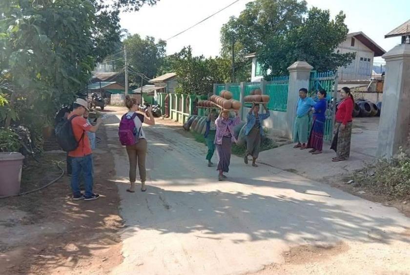  Foreign tourists seen taking photos of lifestyle of local villages in Kyaukmyaung