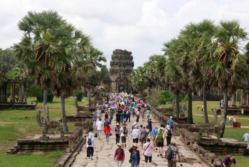 Tourists visit Siem Reap's Angkor Wat in 2017. Heng Chivoan
