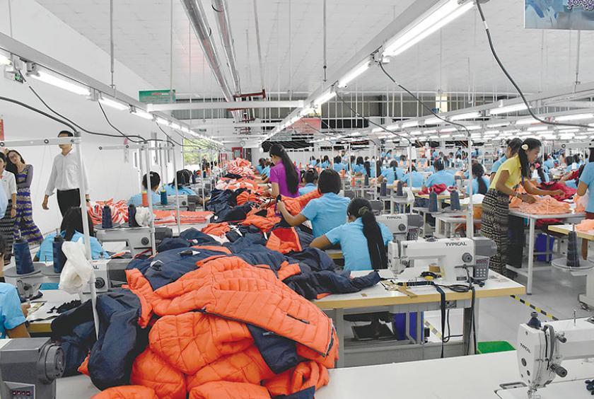 Photo shows workers at a garment factory in Yangon. (Photo-Zeyar Nyein)