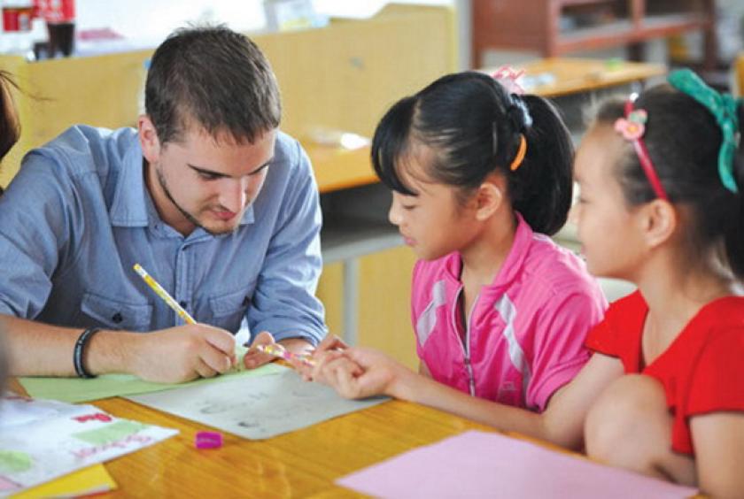 Guangdong schools to ensure foreign teachers