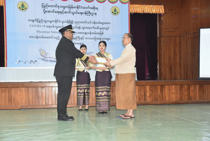 Union Minister Thant Sin Maung presents honorary award to Captain Khup Khan Mung