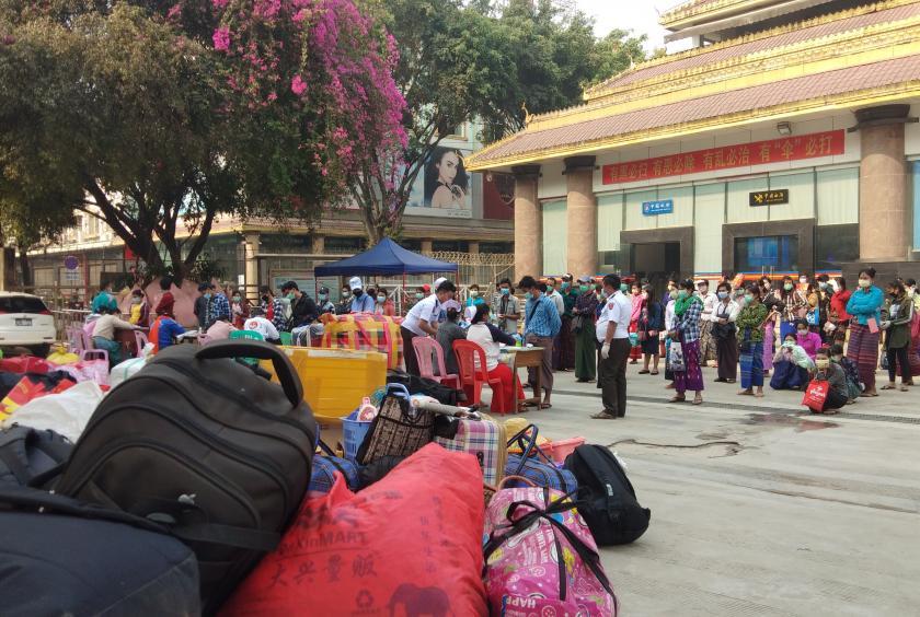 Myanmar citizens returned from China seen at Muse border gate