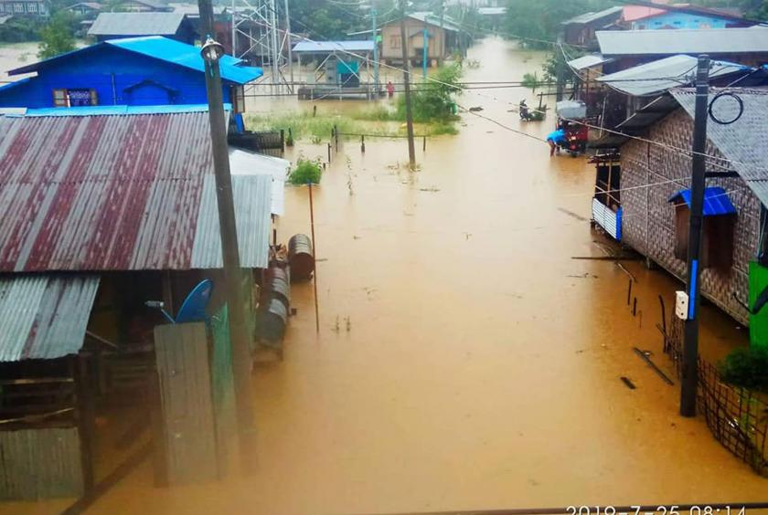 Flood water covered a residential area in Mogaung