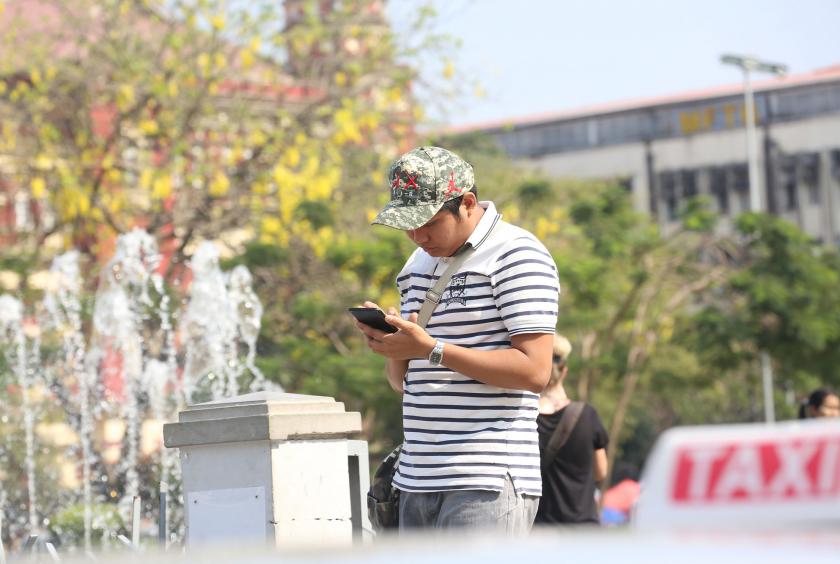 A man using mobile internet (Photo-Kyi Naing)