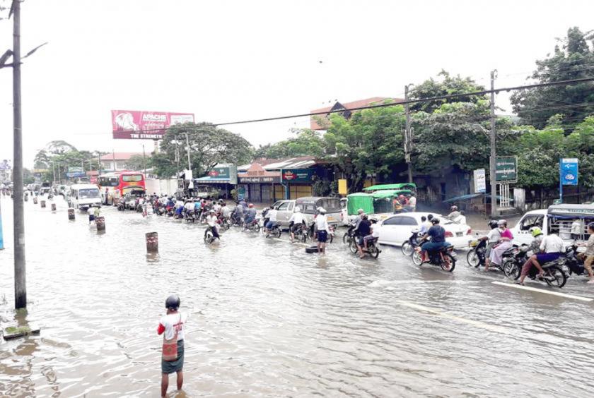 Water covered Yangon-Bago Road on September 13