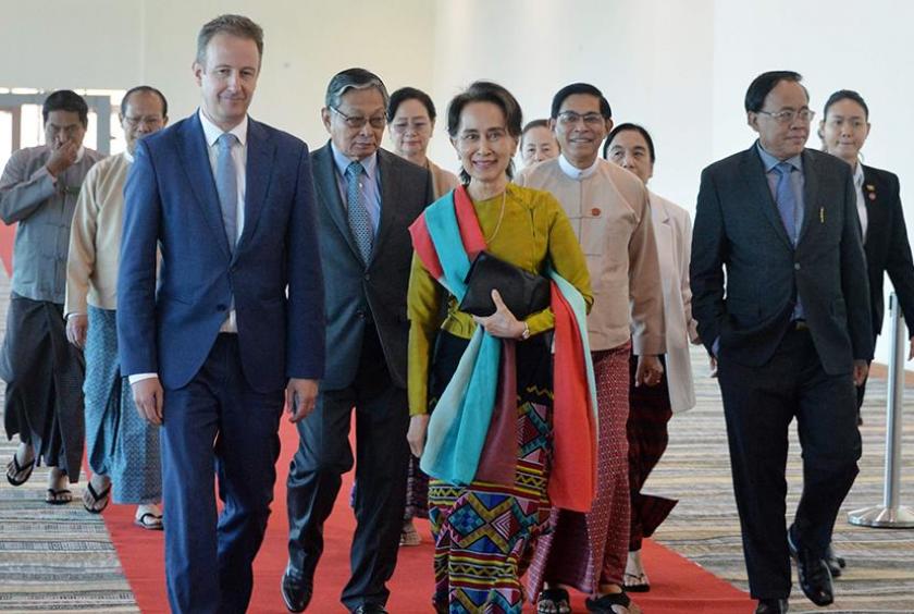 The State Counsellor Aung San Suu Kyi leaves to defend Myanmar at The Hague.