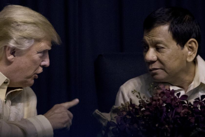 President Donald Trump speaks with Philippines President Rodrigo Duterte at an Asean Summit dinner at the SMX Convention Center on Nov. 12, 2017, in Manila, Philippines. (File photo / AP)  