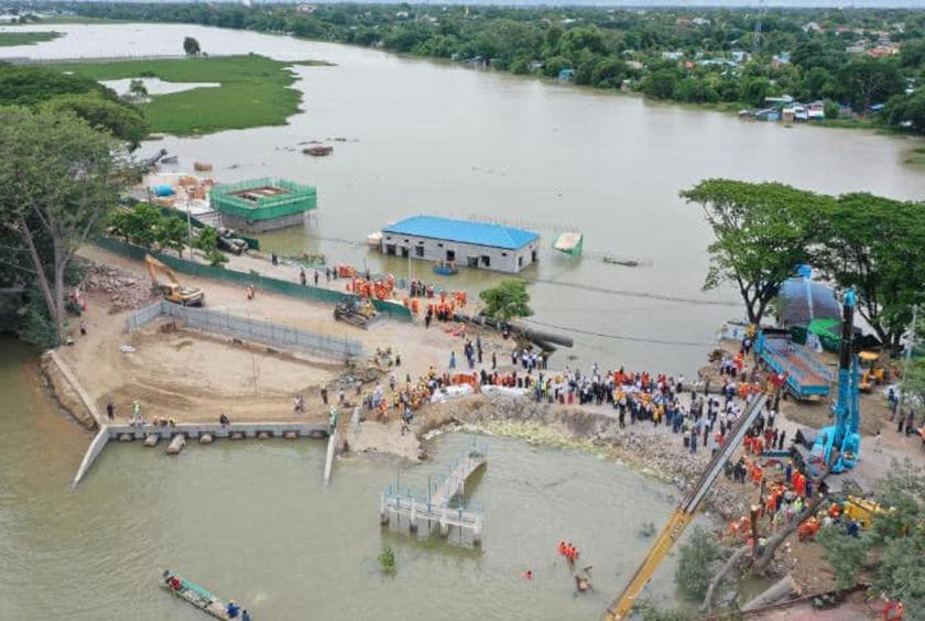 Aerial view shows water from Ayeyawady River flows into villagers after embankment collapse (Photo-Mandalay News Team) 