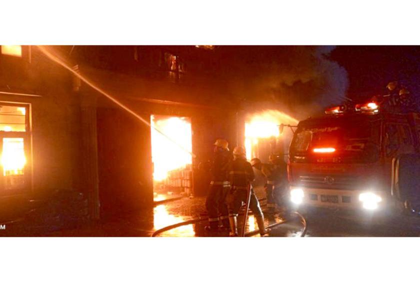 Firefighters working to extinguish the fire that occurred in Pyigyidagun Township on September 18 (Photo - MFSD).