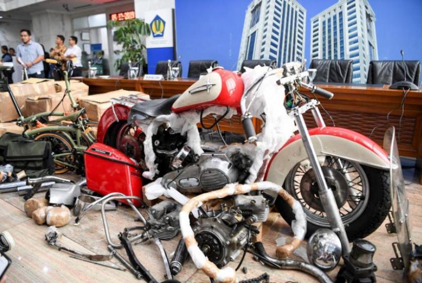 The undeclared Harley Shovelhead and one of two high-end Brompton folding bikes which were brought into Indonesia on a Garuda Indonesia flight.PHOTO: REUTERS