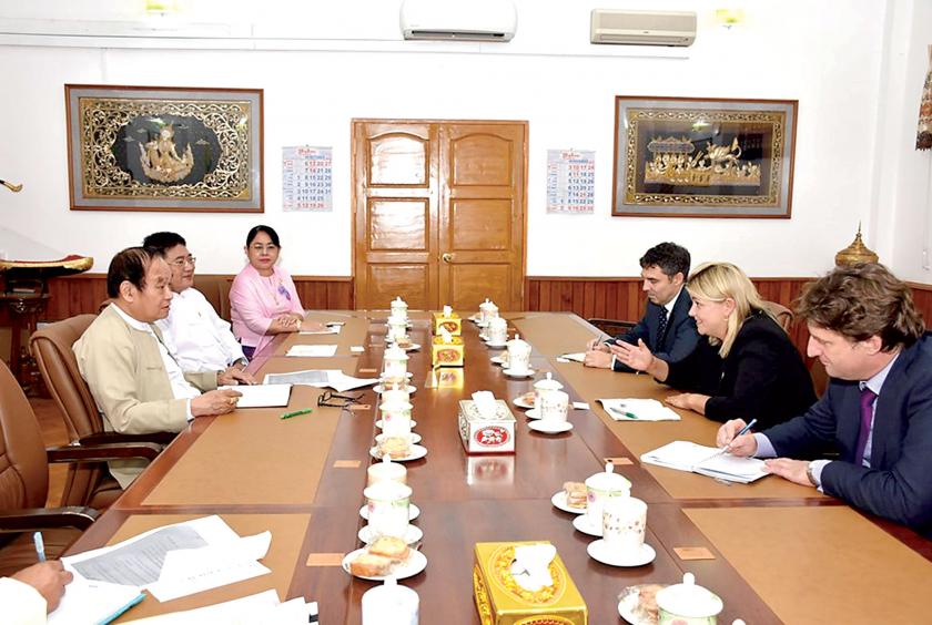 Dr. Myint Htwe of the Ministry of Health and Sports meets the officials of the DFID in Nay Pyi Taw on October 5.