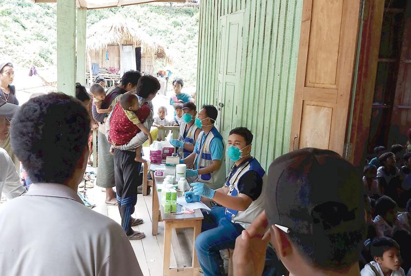 Health staff providing healthcare in Naga Self-administered Zone.