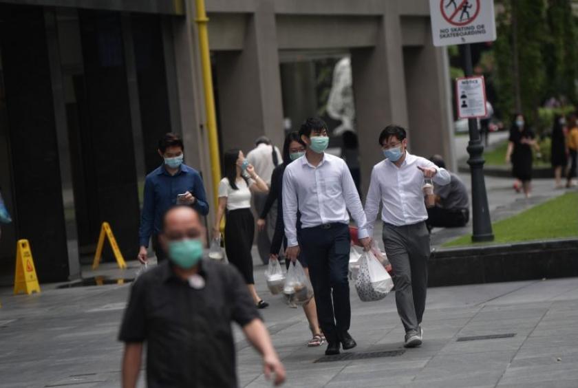 Phases could be rolled back should the outbreak flare up again.ST PHOTO: KUA CHEE SIONG
