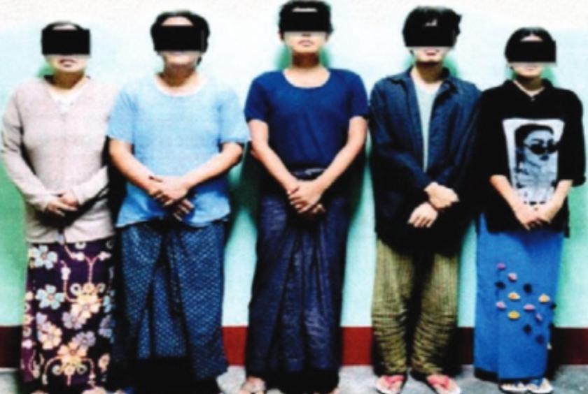 Family members of the accused Thuzar Maung in a documentary photograph.