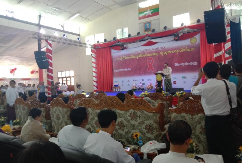 Dr. Myint Htwe, Union Minister for Health and Sports, gives a speech at a ceremony to mark the World AIDS Day in Yangon.