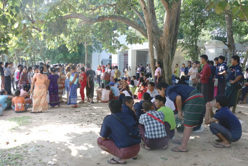 Garment workers gather in front of Yangon Region Government Office.