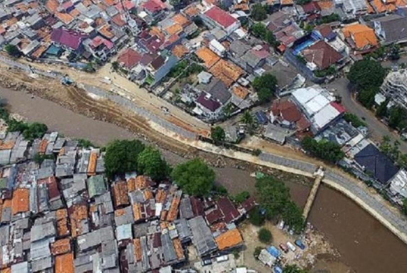Flooding in South Jakarta  as Kali Pulo River  embankment 