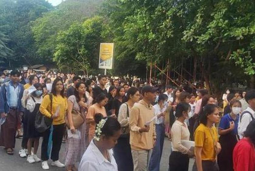 Caption: People are lining up to sit for the JLPT ( Photo-Yanmyo Thein facebook)