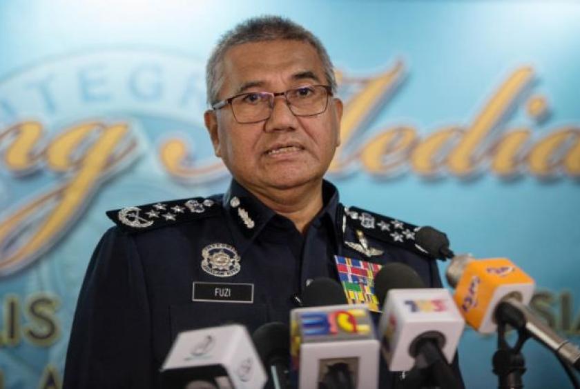 Malaysian police chief says his overseas trip not funded by gambling