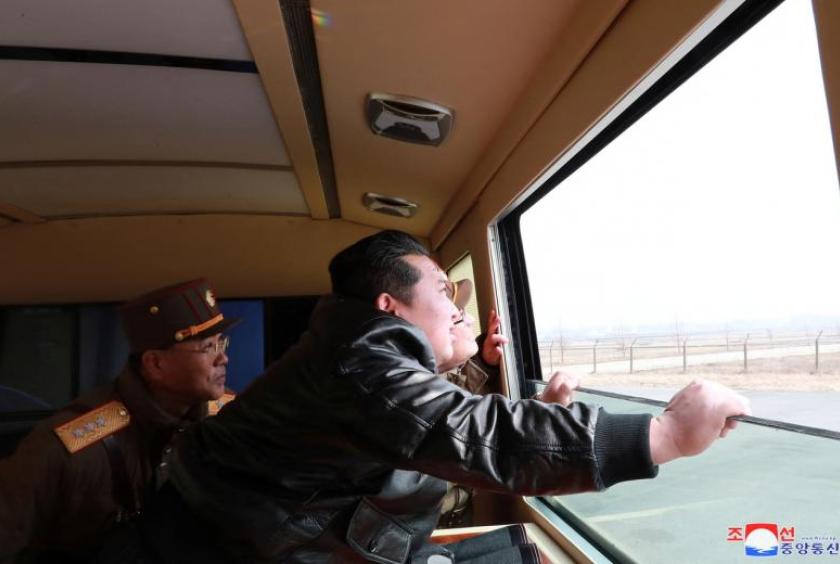 North Korean leader Kim Jong Un observing what North Korea's state media reports is a "new type" ICBM. PHOTO: REUTERS