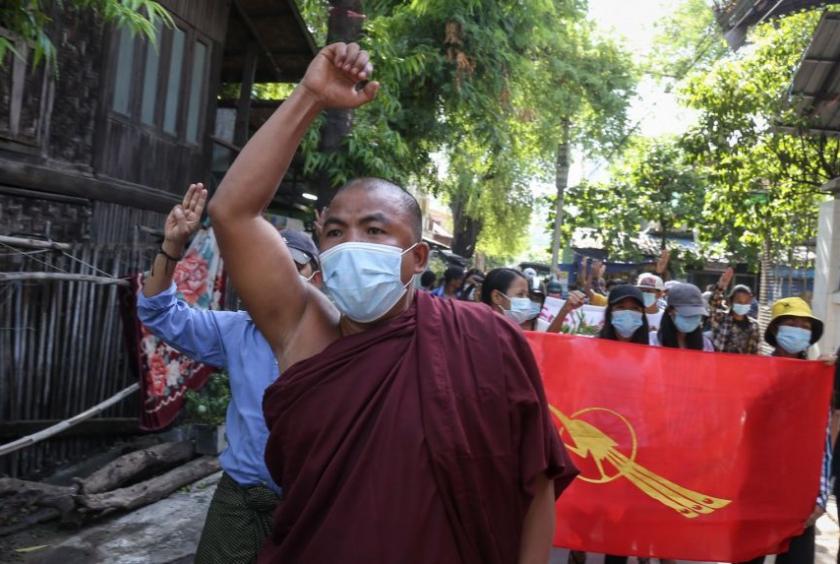 A monk gestures during a protest against the military takeover, in Mandalay, Myanmar, on May 25, 2021.PHOTO: EPA-EFE