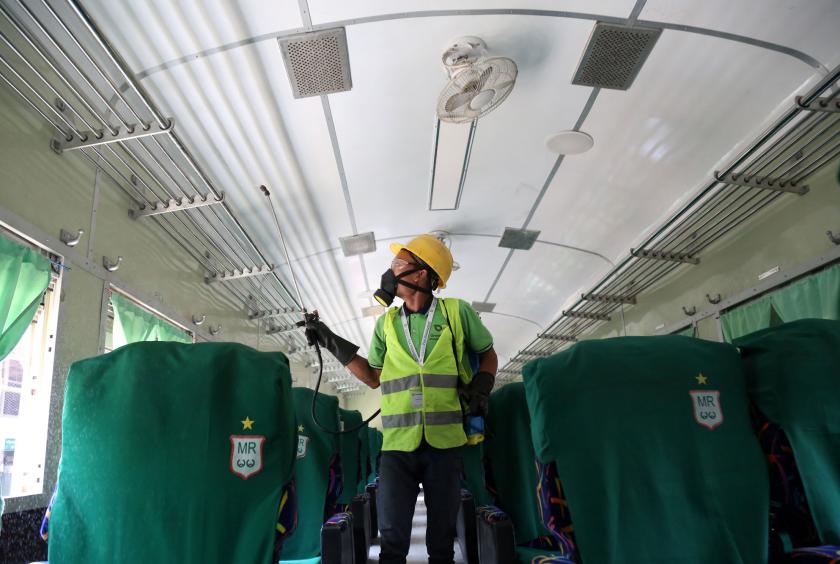 A train coach being disinfected. (Photo-Kyi Naing) 