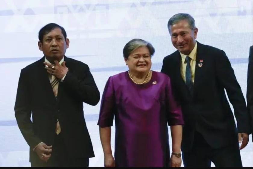 Myanmar's Foreign Secretary Aung Kyaw Moe, Philippine Foreign Undersecretary Theresa Lazaro and Singaporean Foreign Minister Vivian Balakrishnan posing for a group photo at the Asean Foreign Ministers' Meeting in Vientiane on Oct 8, 2024. - AP