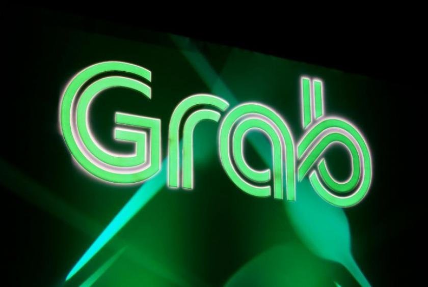 According to the statement, WhiteCoat's collaboration with GrabExpress is in line with Grab's vision to support local tech companies in Singapore.PHOTO: ST FILE